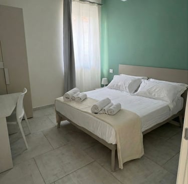 domus casa vacanze stanza da letto