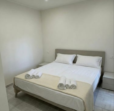 domus casa vacanze stanza da letto