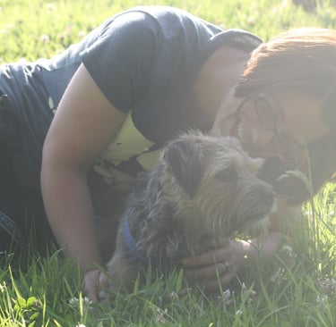 Suzanne from Bark and Ride with her Border Terrier, Stan