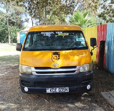 Yellow school van for Duma School from Vanna Ventures