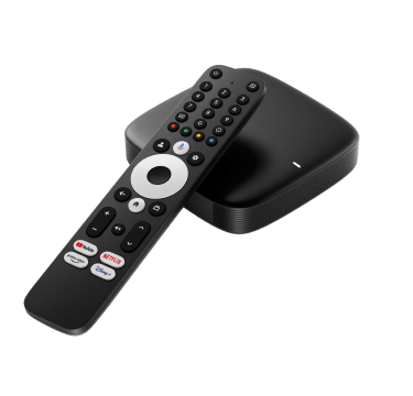 Black smart TV box and remote control with dedicated streaming app buttons.