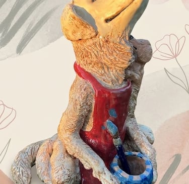 Hand-sculpted ceramic Golden Retriever artist sculpture in warm honey glazes.