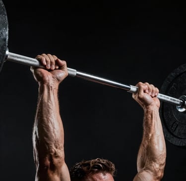 a group of people walking along a beach at sunset