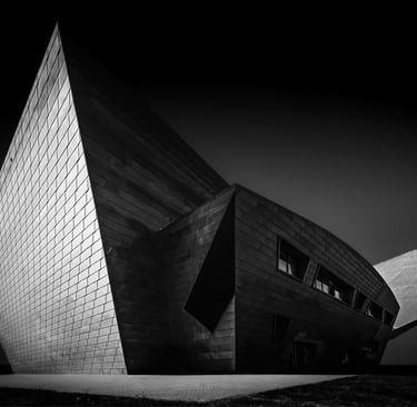 Fine art architecture photograph "Lithos" by Anna Wacker — monumental angular museum facade in black and white