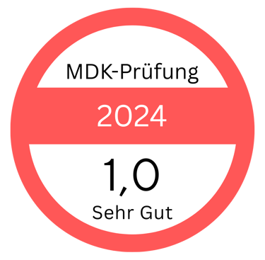 a red and white circle with the words mdk printing on it