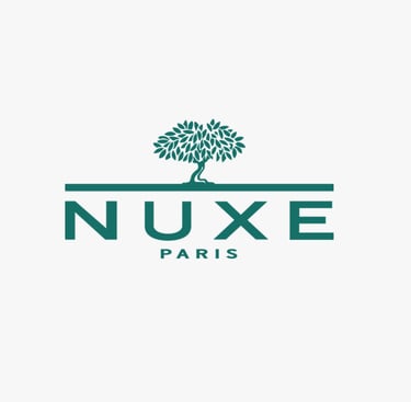 Logo of NUXE, a global beauty brand whose standards are met by King Fly.