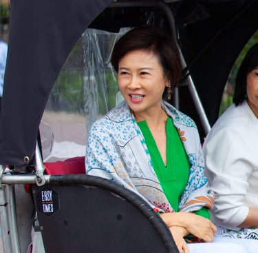 chinese woman on bike taxi