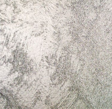 A cooler silver paint sample showing off its beautiful grainy surface