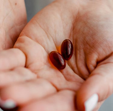 Cupped hands holding medicine pills