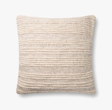 a pillow with a white and beige striped pillow
