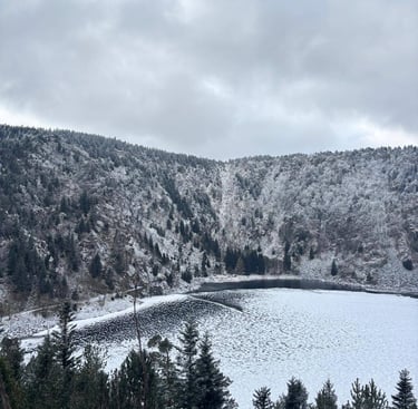 a person on a snow covered mountain top