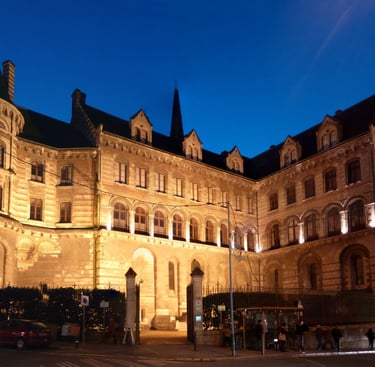 a large building with a clock tower in the middle of it