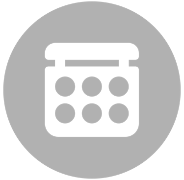 White makeup palette icon with six circular shades inside a black circle for beauty and cosmetics branding.