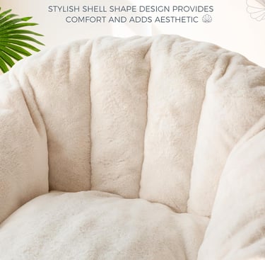 A plush, cream-colored faux fur shell-shaped chair cushion offering a stylish and comfortable aesthetic.