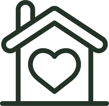 a house with a heart shaped house in the middle of it