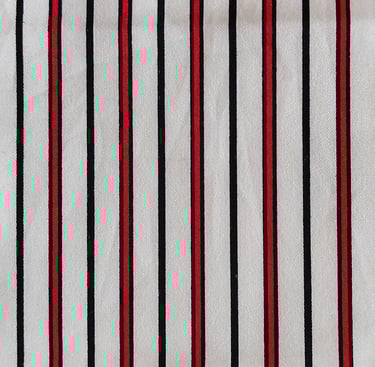 a striped shirt with a red and black stripe