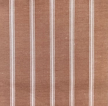 a striped brown and white striped fabric with a white stripe