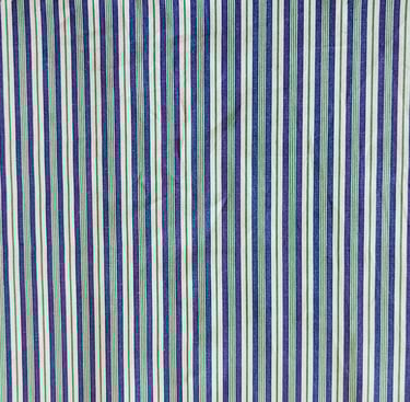 a blue and white striped shower curtain with a blue and white striped shower curtain