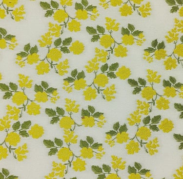 Jacquard fabric with yellow and white green leaves and flowers