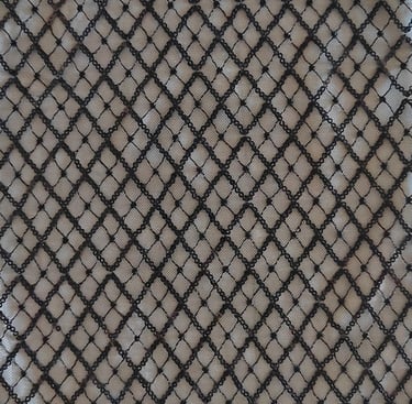 Square patterned fabric made with black beads