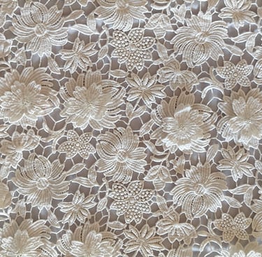 White lace fabric with three-dimensional embroidered flowers