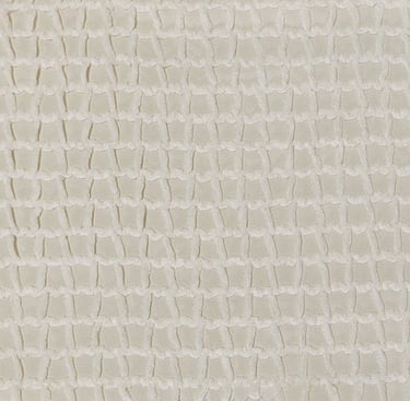 a white and beige jacquard fabric with a pattern of wavy lines