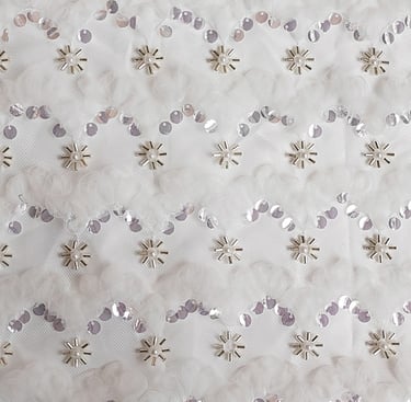 Lace fabric with embroidered sequins and tube beads