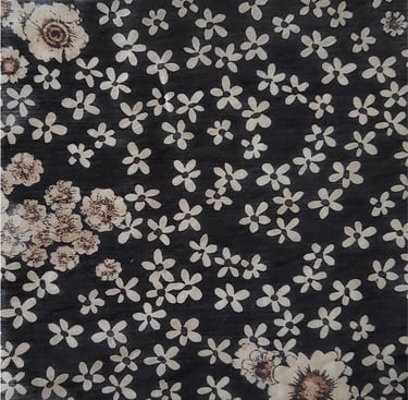 a black and white floral rug with a black and white floral pattern