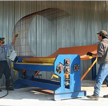 Manhole cage roller machine