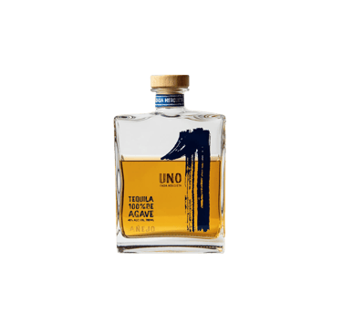 a bottle of uno tequila añejo - premium tequila añejo
