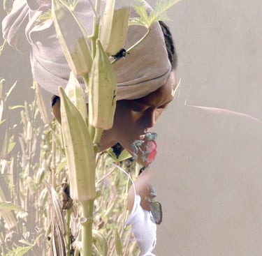 Close-up of a performer standing in tall grass – La distanza di sicurezza by Tina Bikic