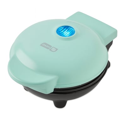 Pastel green Dash Mini Waffle Maker with closed lid, shown as a compact countertop appliance