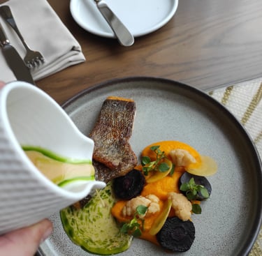 grilled fish with carrot puree and split butter sauce