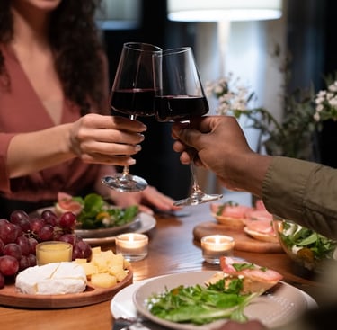 couples toasting wine