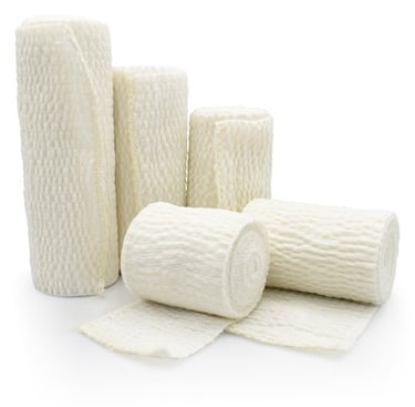 a group of white bandages and bandages on a white background
