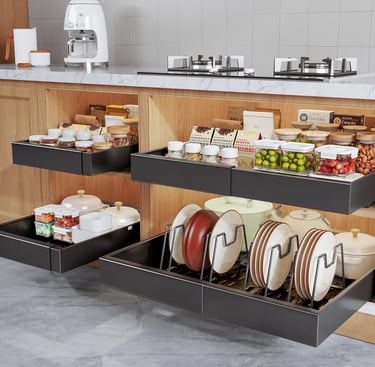 Modern kitchen with pull-out cabinet organizers and drawers storing plates, jars, and cookware.
