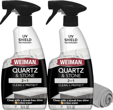 Two bottles of Weiman Quartz and Stone 2-in-1 cleaner and protector spray with a microfiber cloth.