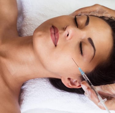 woman receiving botox injection
