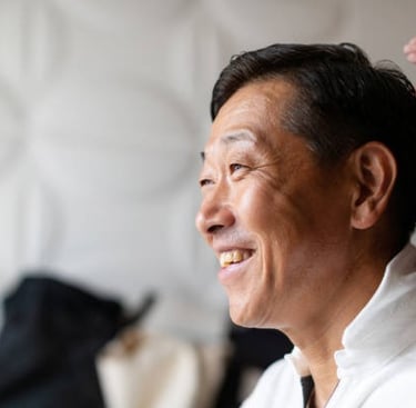 smiling man receiving hair assessment