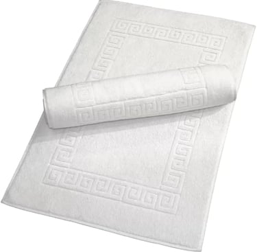 White cotton bath mat set with Greek key border pattern and rolled towel mat