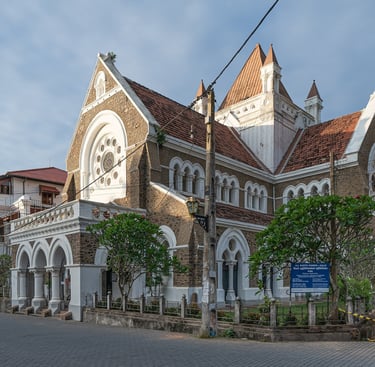 a large building with a clock tower and a clock tower