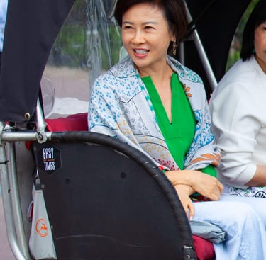chinese woman on bike taxi