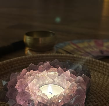 a candle with a candlelight on a table