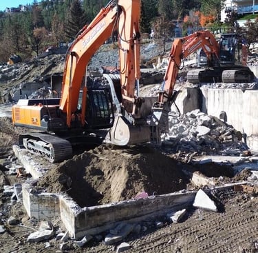 two excavators digging