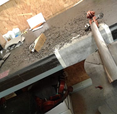 Planing a fingerboard to correct shape and fix buzzing.