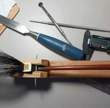 Rehairing a bass bow with black hair