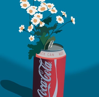 Une canette de coca qui sert de vase où sont des marguerites 