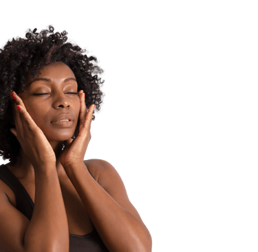 black woman using cafine paraben free vegan skincare product