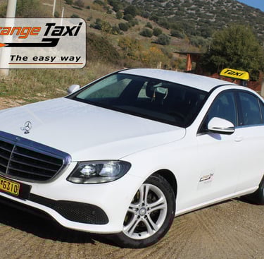 White Mercedes taxi in Kavala - Orange Taxi Kavala transfer services