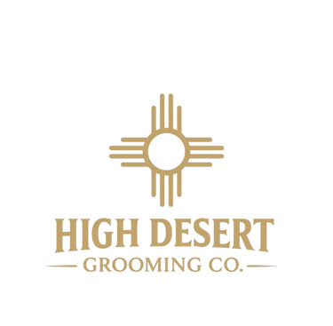 High Desert Grooming Co. logo featuring a gold Zia sun symbol and elegant serif typography on a black background.